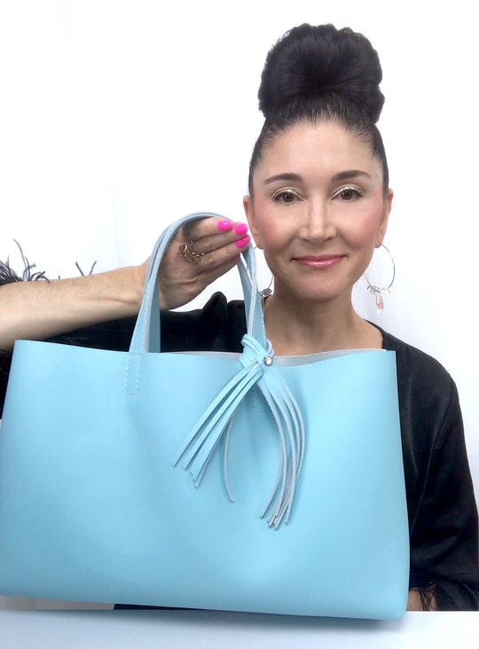 Bag Designer, Lisa Ramos showcasing Blue Tote Bag Made in USA