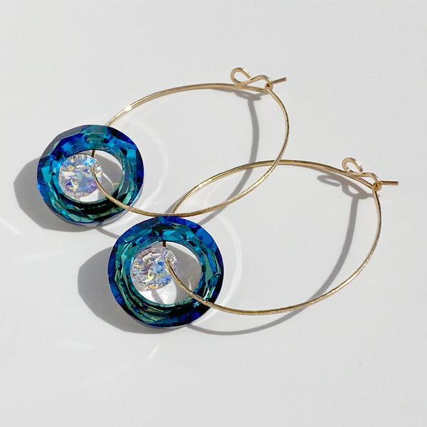 Picture is a pair of Blue and Iridescent Versatile Crystal 14k Gold Hoop Earrings from the MONOLISA Jewelry Collection |  Jewelry Made in California by Bay Area Jewelry Designer Lisa Ramos