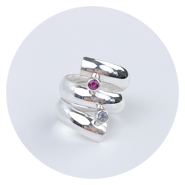 Picture is a Sculpted Argentium Silver gemstone ring with a ruby and spinal | MONOLISA Gemstone Rings designed with amethyst, pearls, peridot, rubies, sapphires, spinel and topaz | Jewelry Made in California
