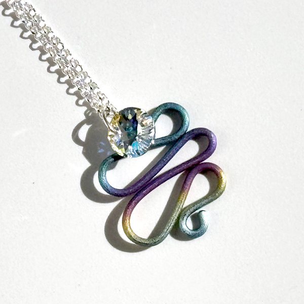 Rainbow Spiral Titanium Pendant Necklace with Iridescent Crystal | MONOLISA Jewelry by Artist Lisa Ramos