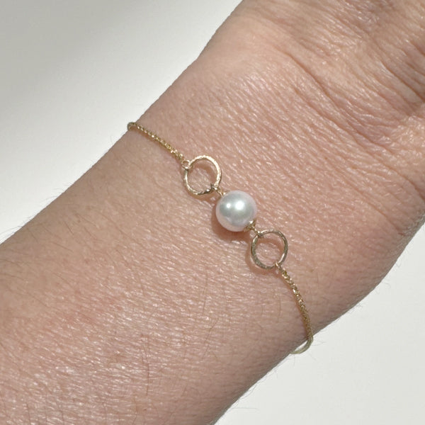 Modeling a Adjustable 14 Karat All Gold Akoya Pearl Bracelet