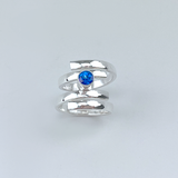 Sterling Silver Blue Topaz Ring - Elegant Spiral