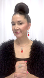Designer Lisa Ramos Wearing the Red Pear Crystal Pendant and matching crystal earrings.