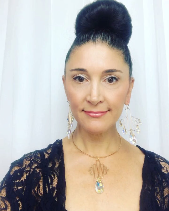Designer Lisa Ramos wearing: 14k Gold Sculpted Romantic Goddess Chandelier Earrings - Ultra Large Crystals